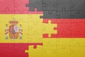 Puzzle with the national flag of spain and germany Royalty Free Stock Photo
