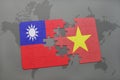 puzzle with the national flag of taiwan and vietnam on a world map background. Royalty Free Stock Photo