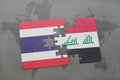 puzzle with the national flag of thailand and iraq on a world map background.