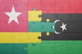 puzzle with the national flag of togo and libya