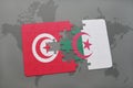 puzzle with the national flag of tunisia and algeria on a world map Royalty Free Stock Photo