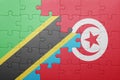 puzzle with the national flag of tunisia and tanzania