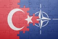 Puzzle with the national flag of turkey and nato