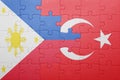 Puzzle with the national flag of turkey and philippines