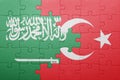 Puzzle with the national flag of turkey and saudi arabia