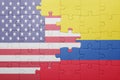 Puzzle with the national flag of united states of america and colombia