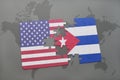 Puzzle with the national flag of united states of america and cuba on a world map background Royalty Free Stock Photo