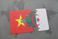 puzzle with the national flag of vietnam and algeria on a world map Royalty Free Stock Photo