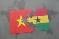 puzzle with the national flag of vietnam and ghana on a world map Royalty Free Stock Photo