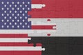 puzzle with the national flag of yemen and united states of america. macro