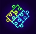 A puzzle with a neon sign several multi-colored connected. Abstract puzzle symbol. Isolated luminous blue, green and