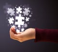 Puzzle pieces in the hand of a woman Royalty Free Stock Photo