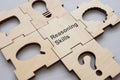 Puzzle pieces and one with words Reasoning skills. Royalty Free Stock Photo
