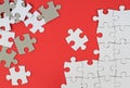 Puzzle pieces on red background Royalty Free Stock Photo