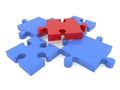 Puzzle pieces in red and blue colors on white Royalty Free Stock Photo