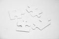 Puzzle pieces white background. solutions, mission, successful, goals, cooperation, partnership Royalty Free Stock Photo