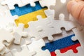 puzzle reveals flags of russia and ukraine, concept, war conflict, mutual relations of both countries world politics