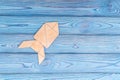 Puzzle rocket on blue wooden background. Business concept idea, to start, success and achievement