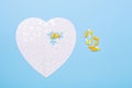 Puzzle in shape of heart white and yellow pills on blue background Jigsaw Concept treatment of heart disease pills Royalty Free Stock Photo