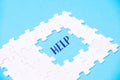 Puzzle with the word HELP written in the middle Royalty Free Stock Photo