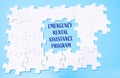Puzzle with the words Emergency Rental Assistance Program written in the middle. Royalty Free Stock Photo