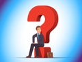 Puzzled business man sitting on a question mark Royalty Free Stock Photo