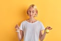 Puzzled woman hesitating what to use garlic or onion