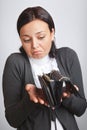 Puzzled woman with opened wallet Royalty Free Stock Photo
