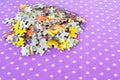 Puzzles on a lilac background. Baby puzzles game. Puzzles set