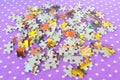 Puzzles on a lilac background. Kids puzzles game. Puzzles set