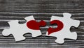 Puzzles with a painted red heart Royalty Free Stock Photo