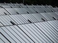 PV Solar Panels From Solar Field Providing Alternative Green Energy Used For Heating. Solar Thermal Collectors Generating