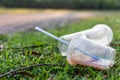 PVC cups litter on public park pose danger to environment Royalty Free Stock Photo