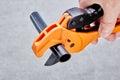 Ratchet pipe cutter for plastic flexible pipes. Royalty Free Stock Photo