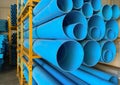 PVC pipes stacking on shelf in warehouse Royalty Free Stock Photo