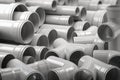 PVC plastic pipes and tubes stacked in warehouse Royalty Free Stock Photo