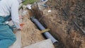 Laying and installation of a sewer pipe