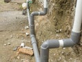 PVC water piping tube installed externally along the wall to supply water. Royalty Free Stock Photo