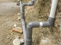 PVC water piping tube installed externally along the wall to supply water. Royalty Free Stock Photo