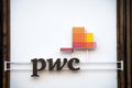 PWC logo in front of their office for Prague, PWC, or pricewaterhousecoopers, is a British accounting and auditing firm