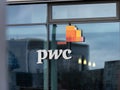 PwC Logo Sign on an Office Building