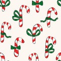 Repeat pattern of Candy Cane Half-Drop with green ribbons