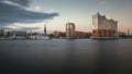 Panorama of Hamburg at sunrise with a concert hall in the foreground and Speicherstadt/Hafencity Royalty Free Stock Photo