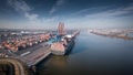 Aerial view of a container ship in the port of Hamburg at a terminal in sunny weather