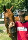 Portrait of a akhal-teke horse ahd trainer