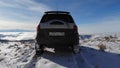 PYATIGORSK, RUSSIA - December 5, 2021: Off-road tour of the winter mountains in Isuzu Vehicross. Aerial view of flying