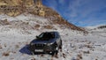 PYATIGORSK, RUSSIA - December 5, 2021: Off-road tour of the winter mountains in Isuzu Vehicross. Aerial view of flying