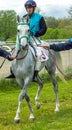 Jockey Gasanov Muslim on grey arabian mare