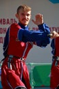 The Cossack dance with sabers in traditional clothes