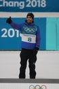 Olympic champion Martin Fourcade of France competes in biathlon men`s 12.5km pursuit at the 2018 Winter Olympics Royalty Free Stock Photo